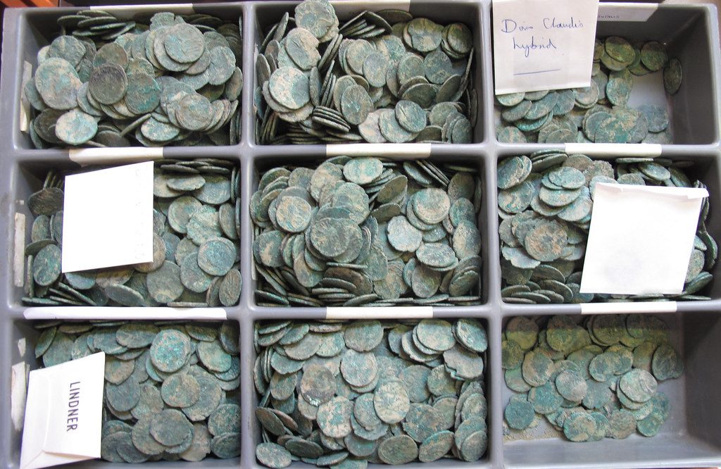 Coins sorted into a counting tray